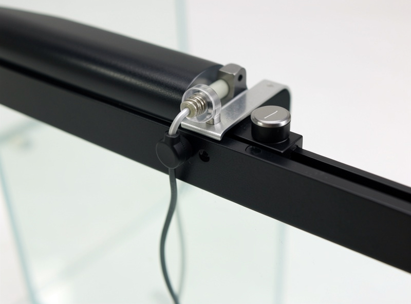 An auto top-off float switch and backup sensor installed on a nano aquarium rim, neat redundant setup